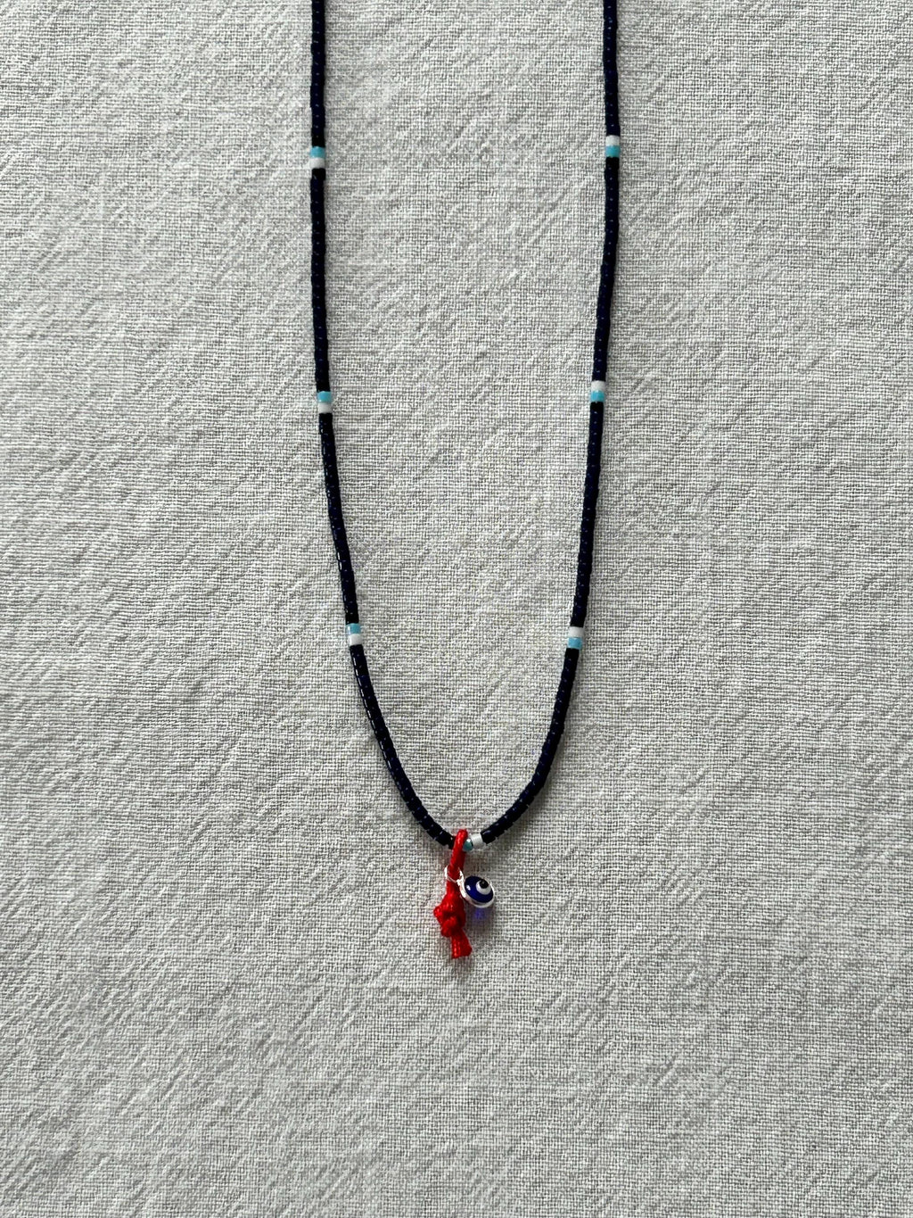 Evil-eye Miyuki necklace on a red string — Koï Design handmade necklace, photo 1