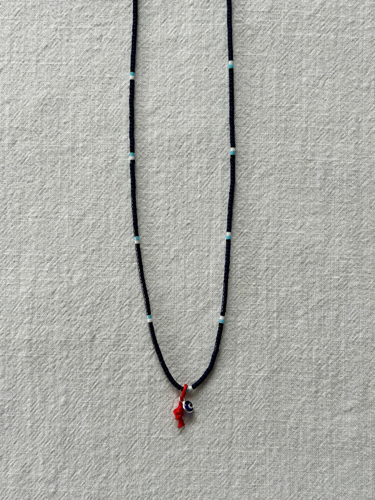 Evil-eye Miyuki necklace on a red string — Koï Design handmade necklace, photo 3
