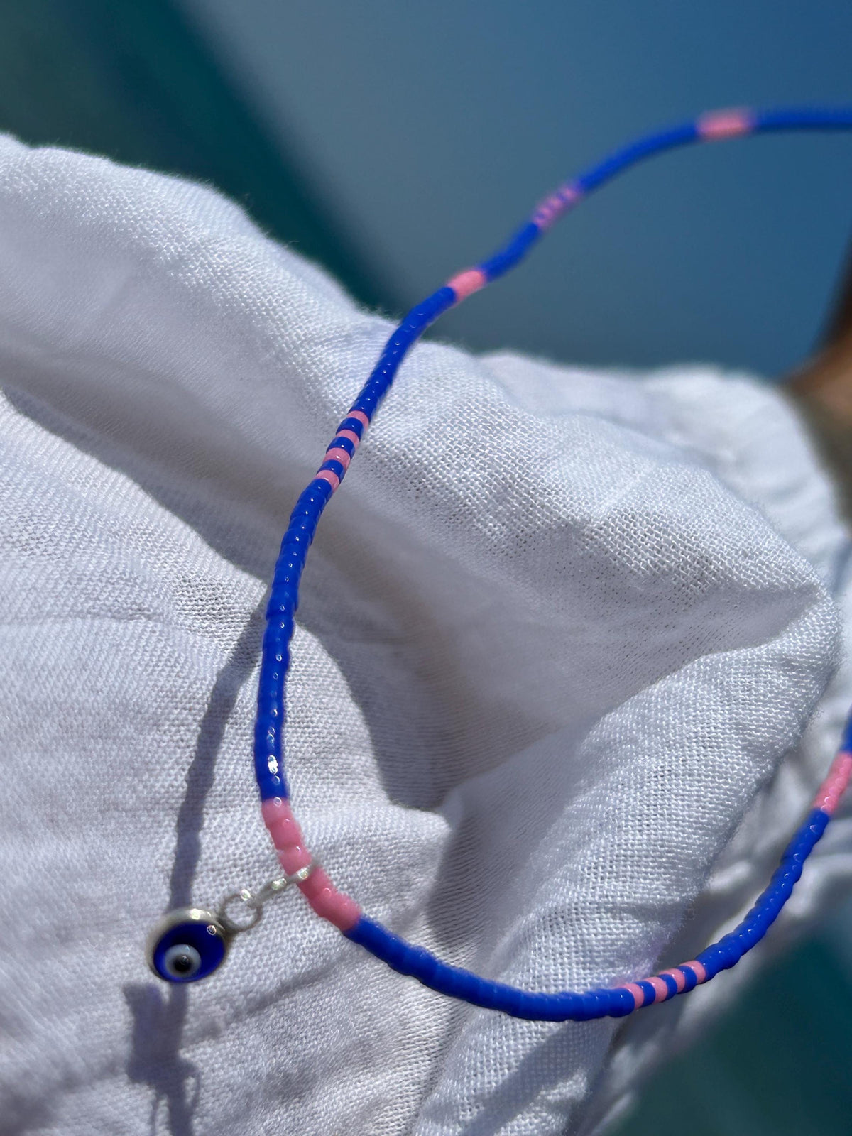 Blue and pink Miyuki necklace with a silver evil eye — Koï Design handmade necklace, photo 6