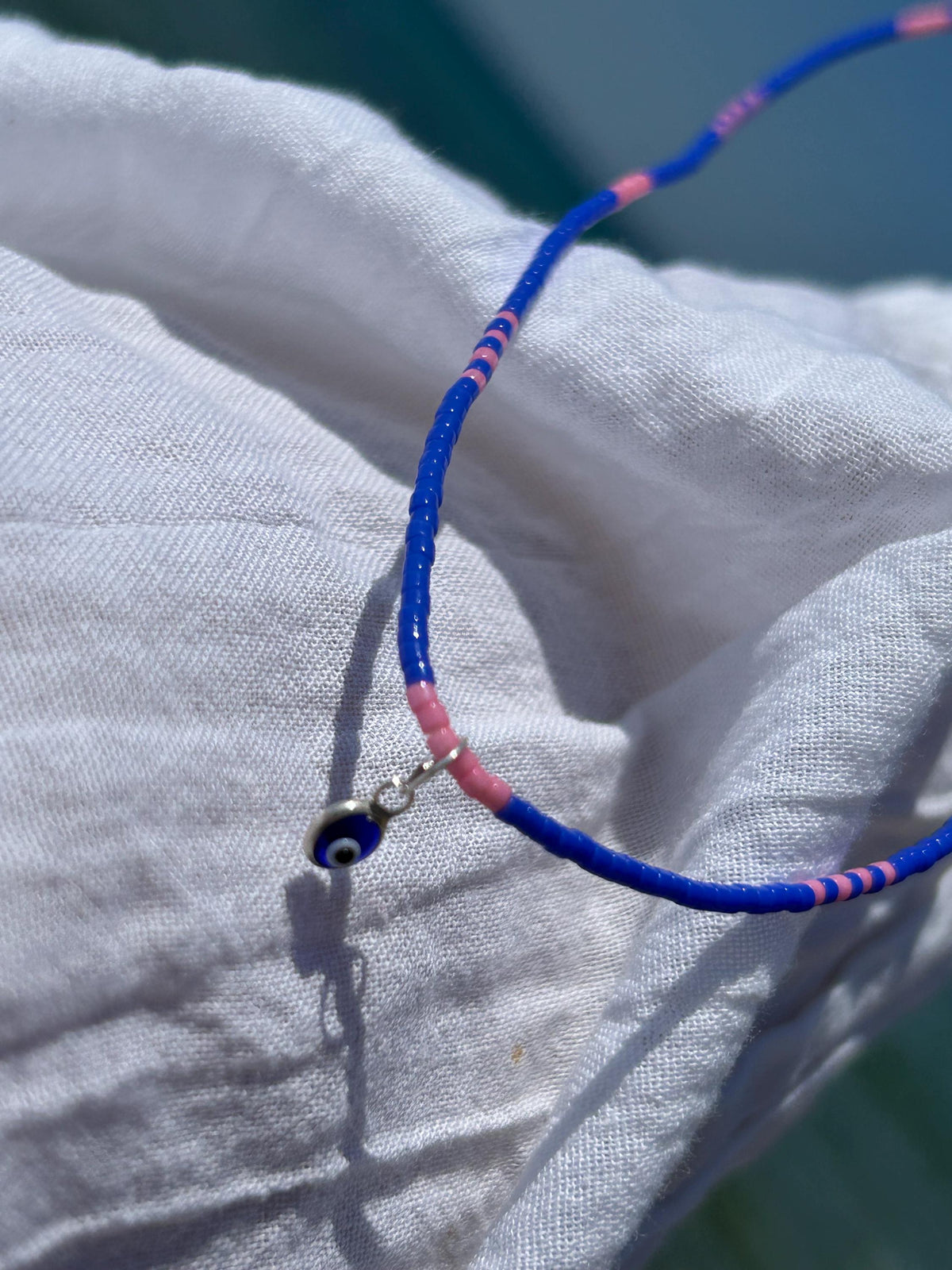 Blue and pink Miyuki necklace with a silver evil eye — Koï Design handmade necklace, photo 8