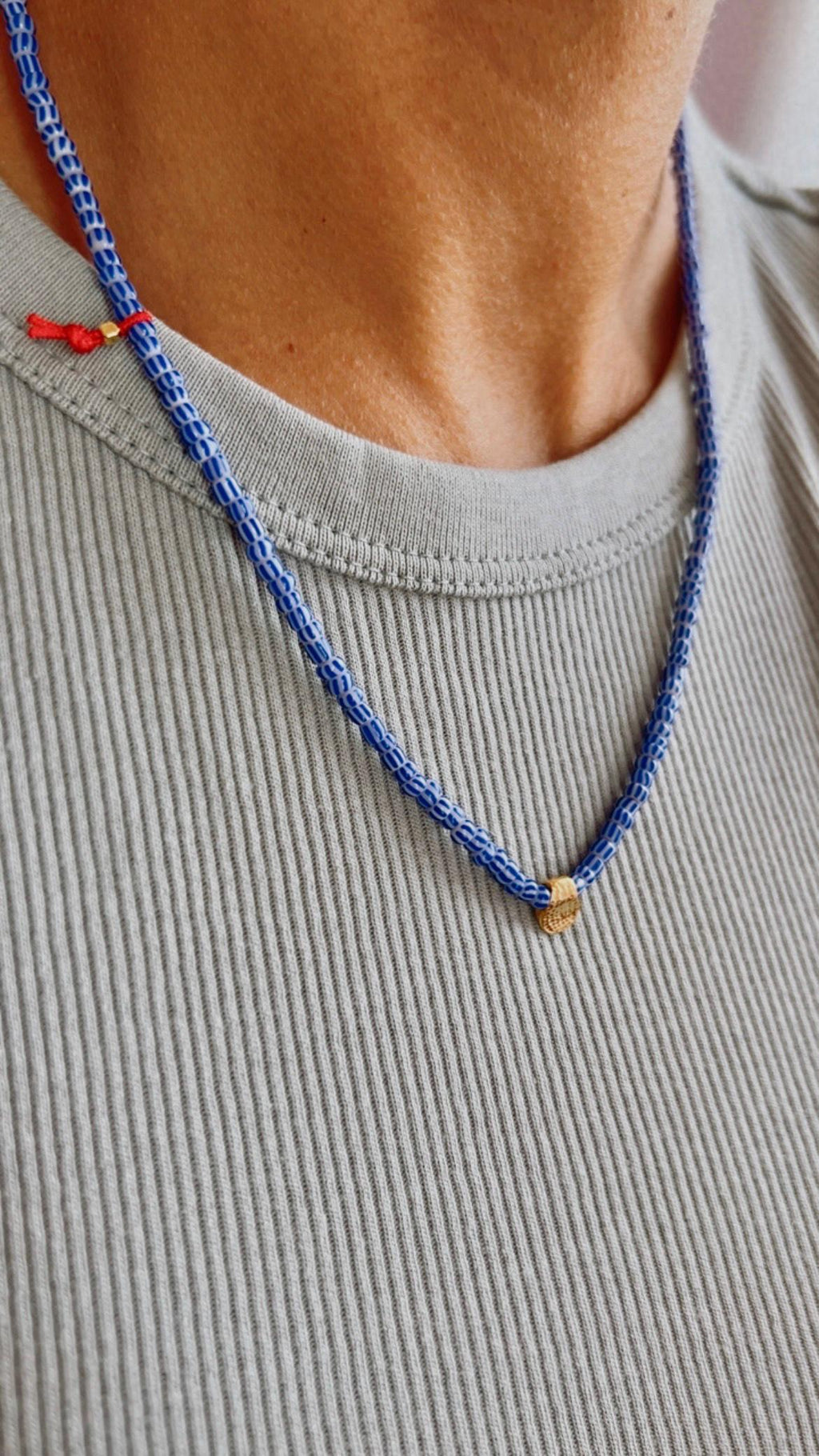 Blue striped glass necklace with a gold-plated charm — Koï Design handmade necklace, photo 1