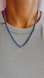 Blue striped glass necklace with a gold-plated charm — Koï Design handmade necklace, photo 4