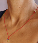 Red string necklace with a gold-plated charm — Koï Design handmade necklace, photo 2