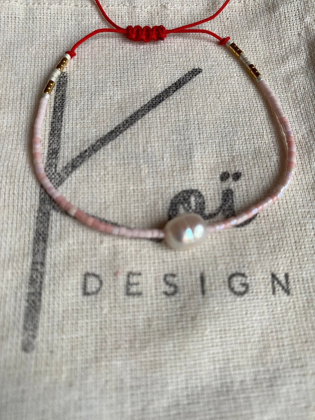 Red String Bracelet — the piece Gwyn reviewed on Etsy